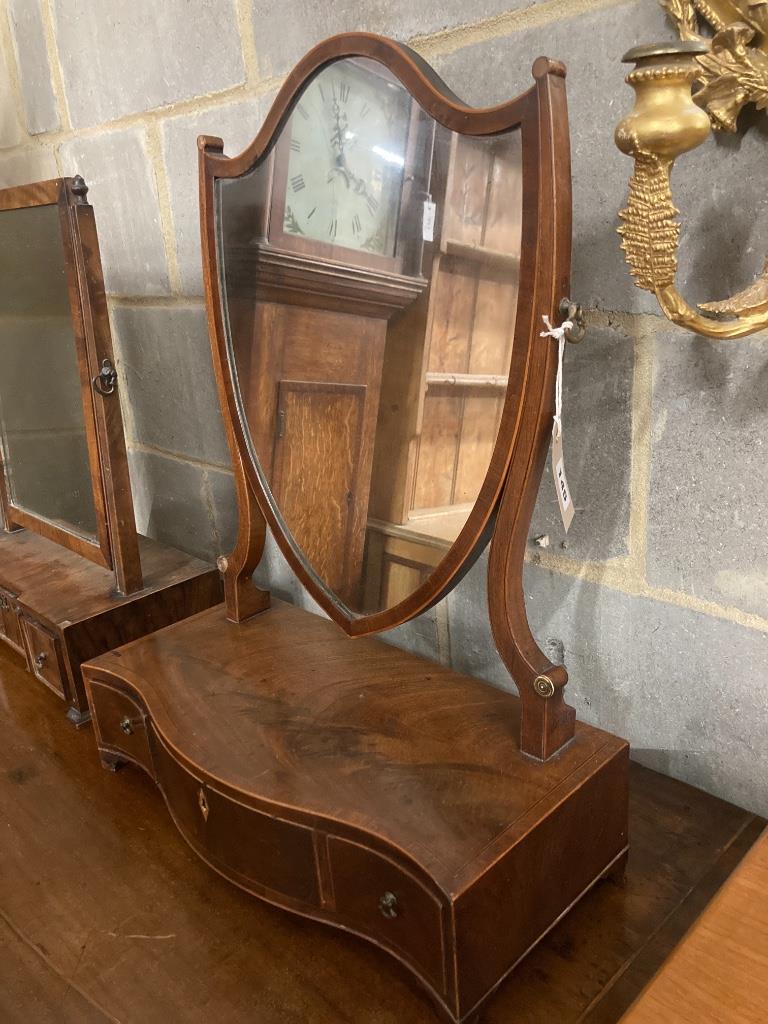 A shield-shaped mahogany toilet mirror with serpentine fronted box base and a walnut swing-frame toilet mirror, larger width 45cm, depth 22cm, height 60cm